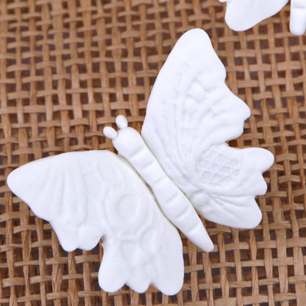 Large Embossed Butterflies - White
