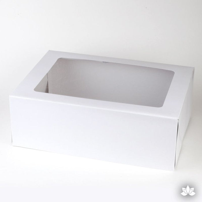Transport your finished cakes safely with this Window Cake Box. The window allows you to see your beautiful cake creations. White Cake Box
