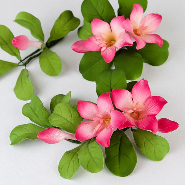 Cambodia Sprays in Pink are gumpaste sugarflower cake decorations perfect as cake toppers for cake decorating fondant cakes and wedding cakes. Caljava wholesale cake supply.