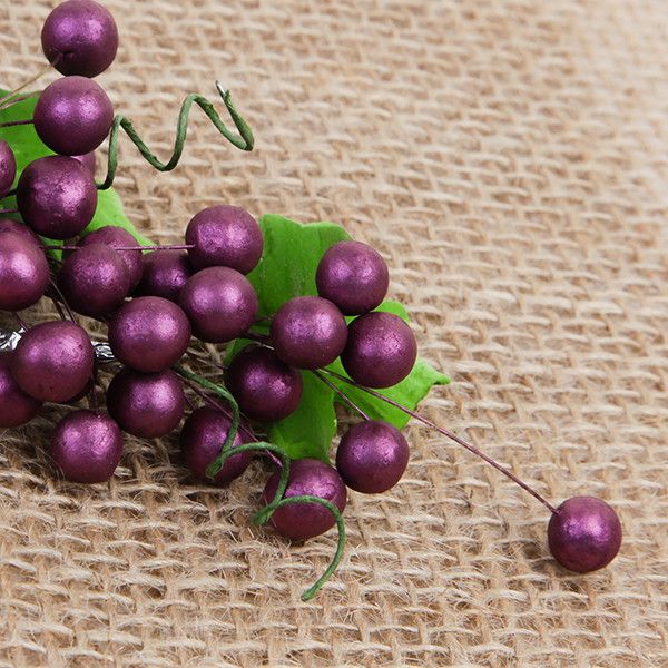 These beautiful Grape sprays in Burgundy are readymade by hand from gumpaste.  Gumpaste flowers offer a way of decorating cakes hassle free for both professional and amateur decorators.  Each spray is bound by bendable wires that make for easy positioning and application on cakes.