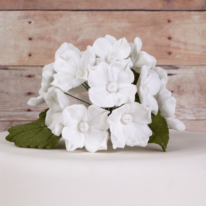 White Hydrangeas and Leaves sugarflowers from gumpaste cake decorations perfect for cake decorating fondant cakes as a cake topper.  Wholesale bakery supplies.