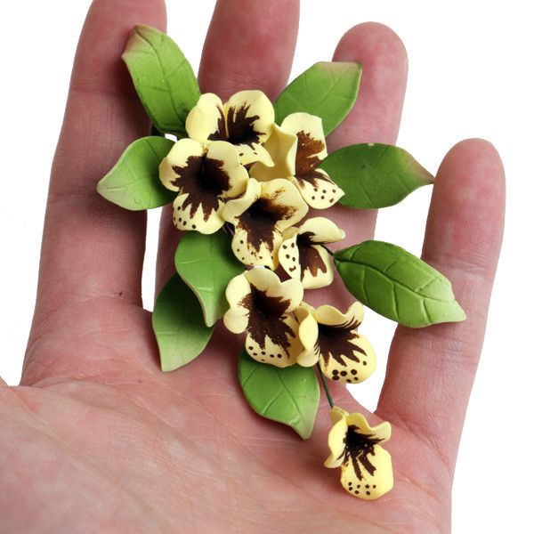 Yellow Tropical Fillers gumpaste sugarflower cake decorations perfect as cake toppers for cake decorating fondant cakes and wedding cakes.  Wholesale sugarflowers. Caljava