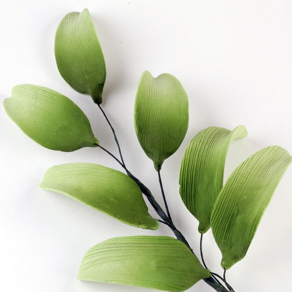 7 Petal Lily Green Leaf Filler sugarflower from gumpaste perfect for cake decorating fondant cakes and wedding cakes. Wholesale sugarflowers and cake supply.