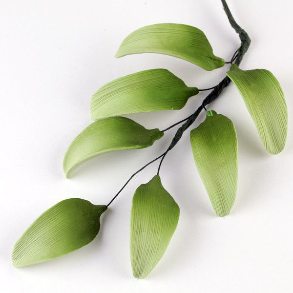 7 Petal Lily Green Leaf Filler sugarflower from gumpaste perfect for cake decorating fondant cakes and wedding cakes. Wholesale sugarflowers and cake supply.