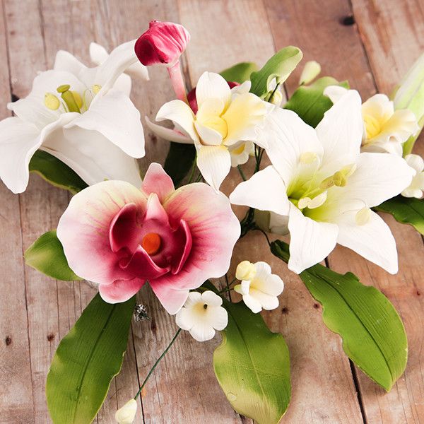 Day Lily & Phalaenopsis Large Orchid Sprays are gumpaste sugarflower cake decorations perfect as cake toppers for cake decorating fondant cakes and wedding cakes. Caljava wholesale cake supply.