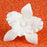 Medium Cattleya Orchids in White are gumpaste sugarflower cake decorations perfect as cake toppers for cake decorating fondant cakes and wedding cakes. Caljava wholesale cake supply.