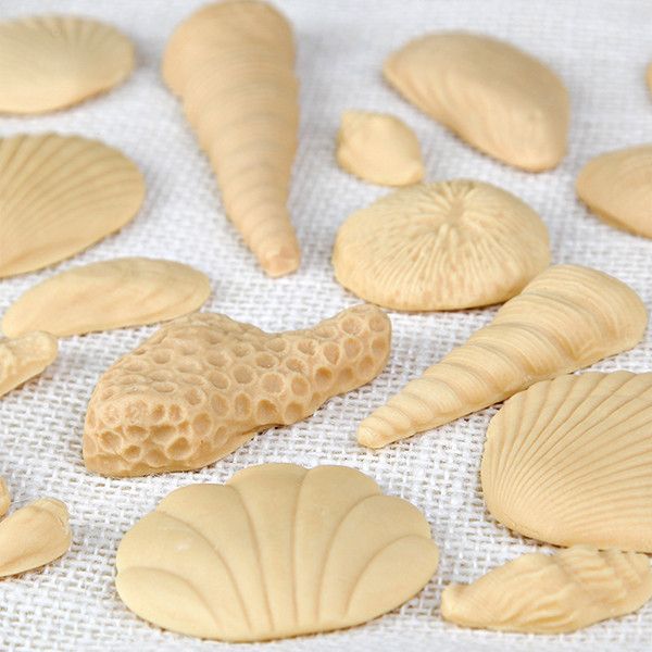 These fun edible fondant Ivory Sea Shells are perfect additions for any “Under the Sea” themed cakes.