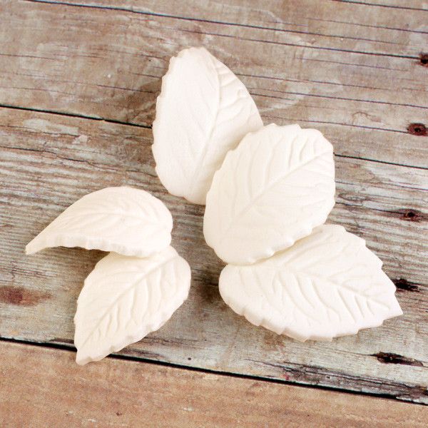 Ivory Rose Leaves Sugarflower cake decoration made from gumpaste perfect as cake toppers for cake decorating fondant cakes and cupcakes.