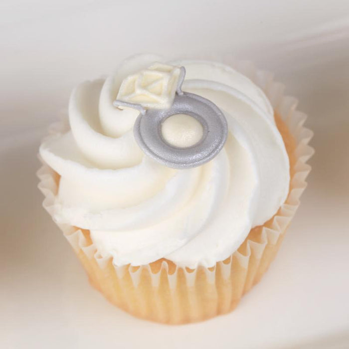 Royal Icing Toppers for decorating your own cupcakes, chocolates, cookies, cakes, and other desserts. Edible hand piped icing toppers ready to use on your food.