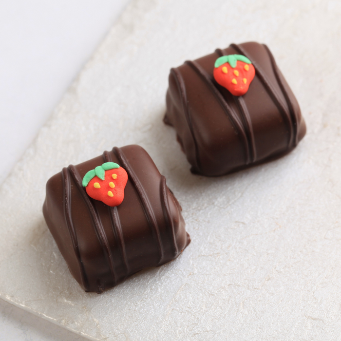 Mini Strawberry Edible Royal Icing Toppers great for decorating chocolates, cupcakes, cookies, cakes, candy and donuts.  Great for decorating strawberry chocolates, cakes, cupcakes, cookies, candy and more.