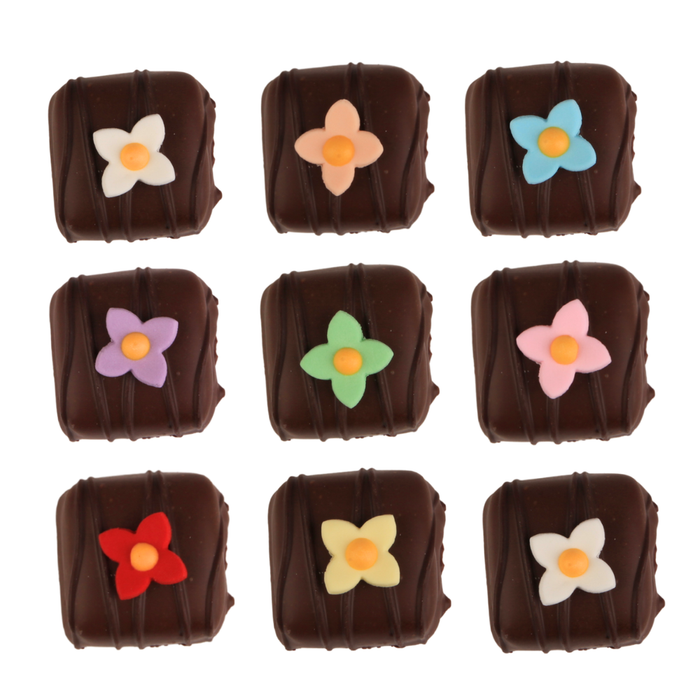 Close-up of 4 petal blossom sugar flower showing detailed petals for cake decorating