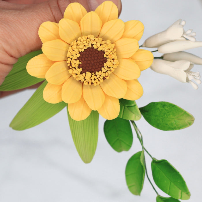 Sunflower Spray are gumpaste sugarflower cake decorations perfect as cake toppers for cake decorating fondant cakes and wedding cakes. Caljava wholesale cake supply.