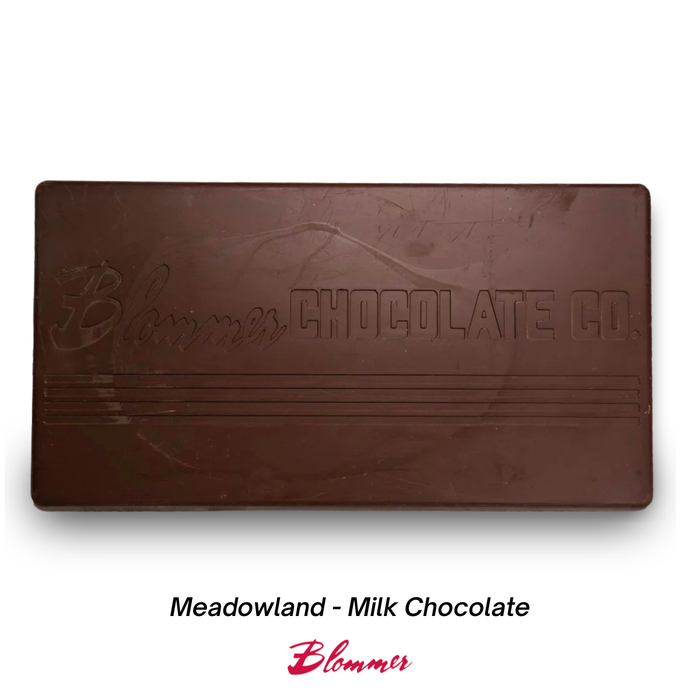 Large 50 pound block of Blommer premium chocolate designed for commercial baking, candy making, cake decorating, and chocolate production.