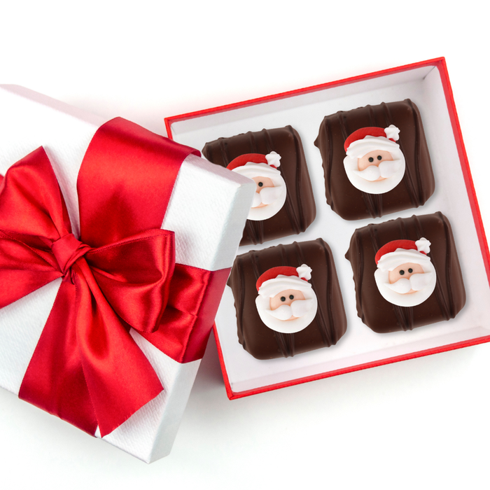 Christmas Santa Face Royal Icing Toppers for decorating Chocolates for Holiday season by Caljava. Christmas gift box of Santa Chocolates.