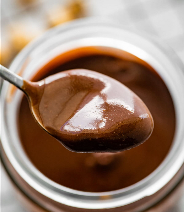 Hazelnut chocolate spread drizzled on croissants, waffles, and crepes for gourmet breakfast and dessert applications