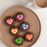 Colorful edible conversation heart icing toppers perfect for chocolate makers and candy businesses for Valentine’s Day