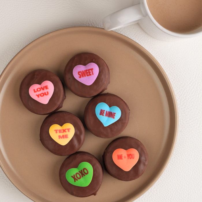 Colorful edible conversation heart icing toppers perfect for chocolate makers and candy businesses for Valentine’s Day