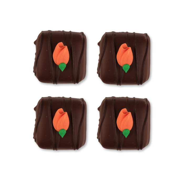 Handmade orange rosebud royal icing toppers by Caljava for decorating cookies and cupcakes