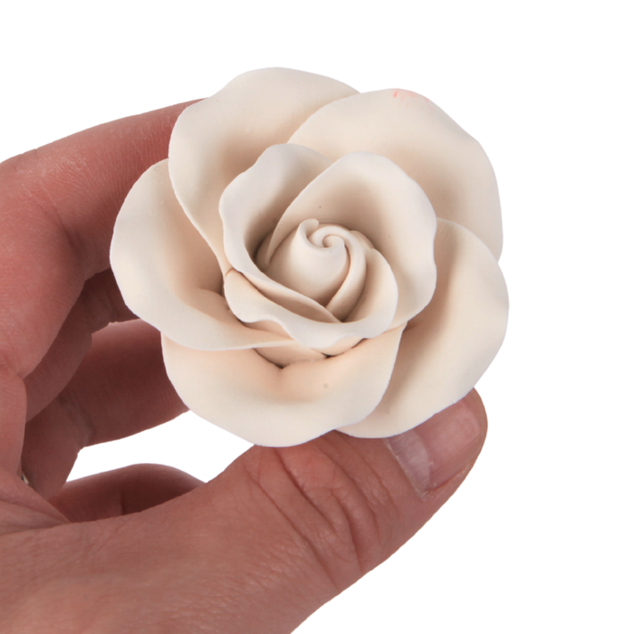 Handcrafted white rose sugar flower used for cake and cupcake decorations