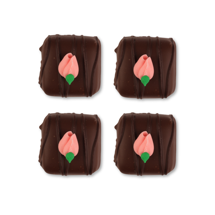Decorative pink royal icing rosebuds for chocolates bon bons and desserts