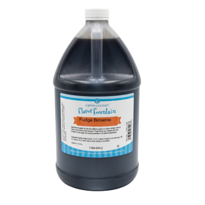 1 gallon Bottle of LorAnn Fudge Brownie Ice Cream & Beverage Flavoring next to a bowl of rich chocolate ice cream.