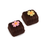 Ready-to-use edible floral cake toppers in assorted fuchsia shades for elegant cake designs