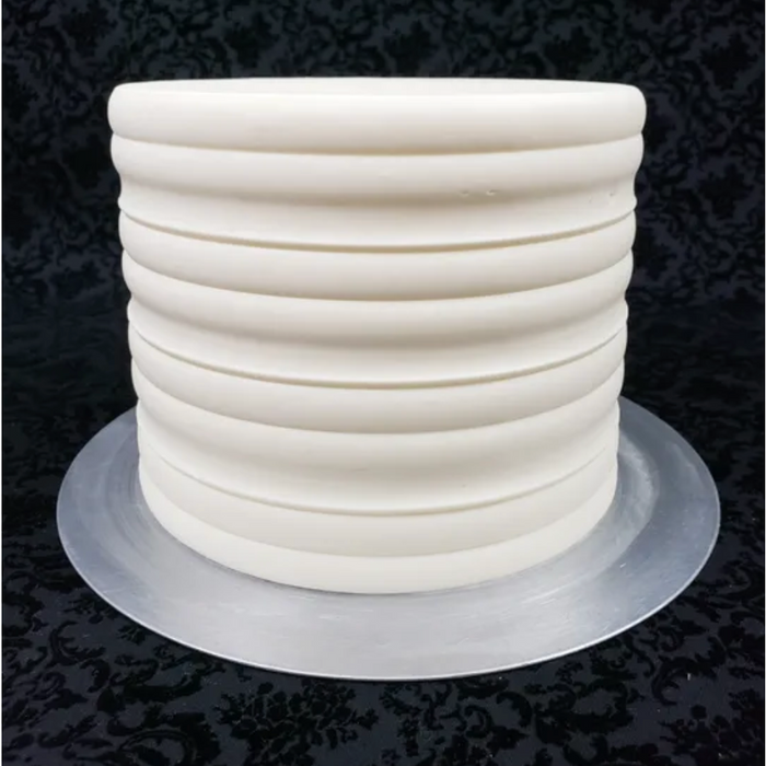 Discover our durable stripe cake icing comb scraper, perfect for cake decorating. Create smooth, textured, and patterned finishes on buttercream, fondant, and frosting. Ideal for bakers of all skill levels! Caljava