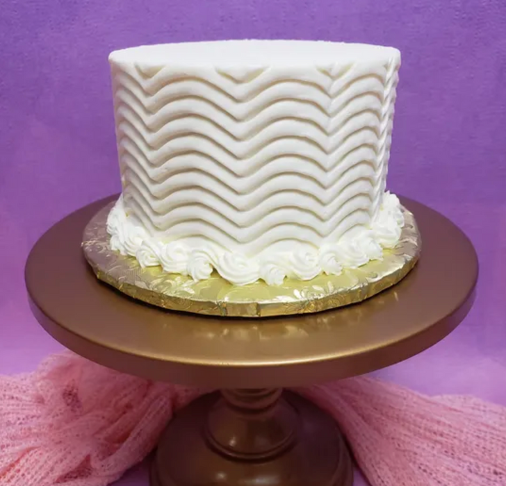 Stainless Steel Cake Comb Icing Scraper by Caljava – Perfect for adding detailed textures and designs to buttercream cakes. Durable, professional-quality cake decorating tool