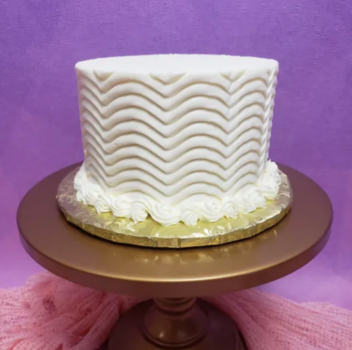 Stainless Steel Cake Comb Icing Scraper by Caljava – Perfect for adding detailed textures and designs to buttercream cakes. Durable, professional-quality cake decorating tool