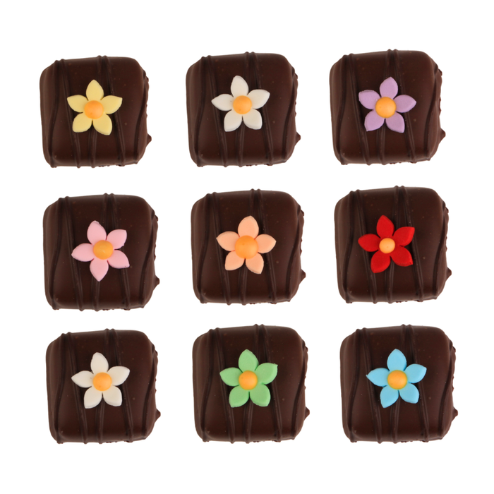 Small edible hyacinth sugar flower decorations for wedding cakes, celebration cakes, and pastries
