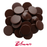 Close-up of glossy Blommer no-tempering milk chocolate melting wafers for cake decorating.