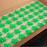 Commercial 90-count bulk packaging of hand-piped edible cannabis leaf royal icing decorations.