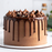 Handcrafted chocolate cake made with smooth Amoretti fudge ganache dripping