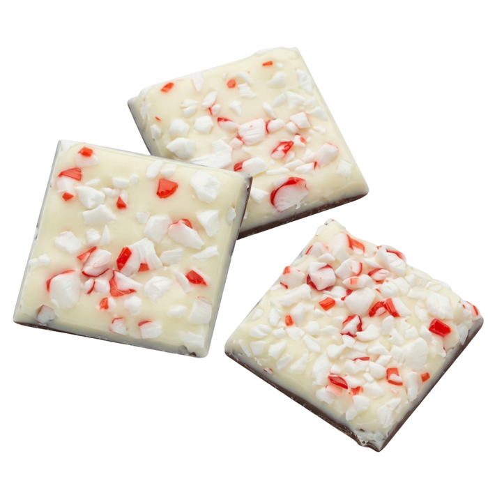 1.25-inch dark and white chocolate peppermint bark squares topped with red peppermint crumble for holiday dessert displays 1080 squares per case for resale
