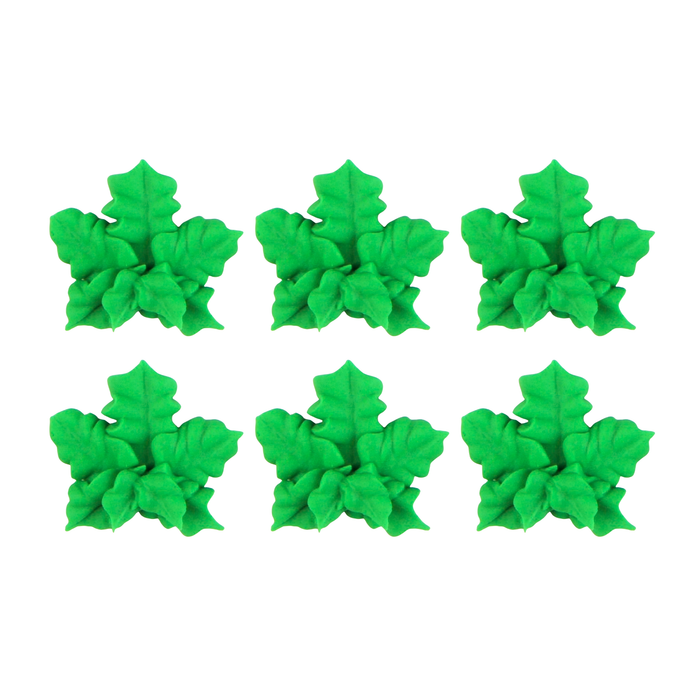 Commercial box of 90-count green cannabis leaf royal icing decorations for wholesale edible producers.