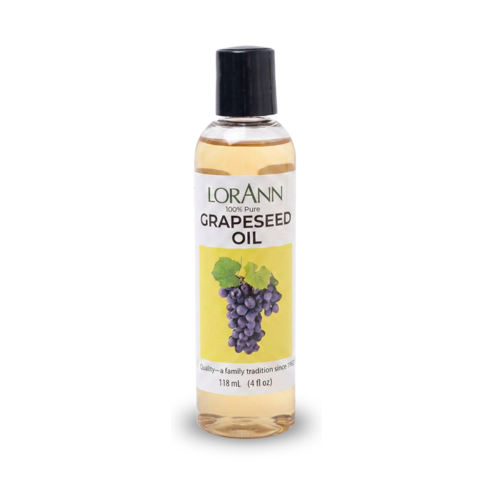 Pouring odorless Grape Seed Oil into baking batter for smooth moisture retention