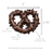 Close-up of a handcrafted jumbo milk chocolate pretzel drenched in chocolate chips in bulk wholesale