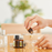 Lightweight Grape Seed Oil poured into hands for smooth, non-greasy massage therapy