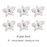 Close-up of a handcrafted 4-inch white Cattleya orchid sugar flower showing detailed petals and realistic center.