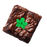 ready to use Hand-piped marijuana leaf icing decorations placed on CBD-infused fudge brownies and baked goods.