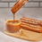 Gourmet caramel churros dipped in smooth melted Peter's 5 lb caramel block
