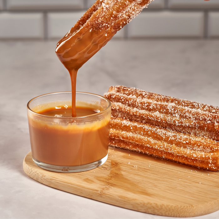 Gourmet caramel churros dipped in smooth melted Peter's 5 lb caramel block