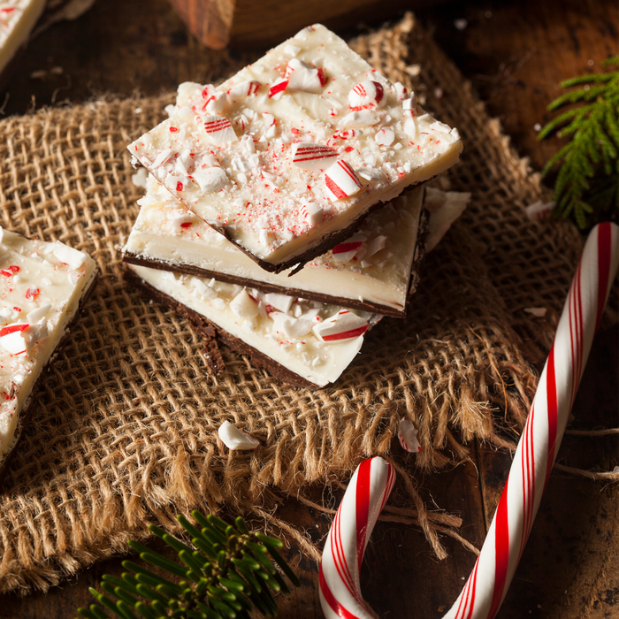 Bulk tray of pre-cut dark and white chocolate peppermint squares ready for quick resale.