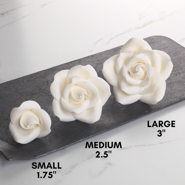 White Gumpaste Roses handmade sugar cake decorations and cake toppers perfect for cake decorating rolled fondant wedding cakes and fondant birthday cakes.  Wholesale sugar flowers and cake supply. Caljava