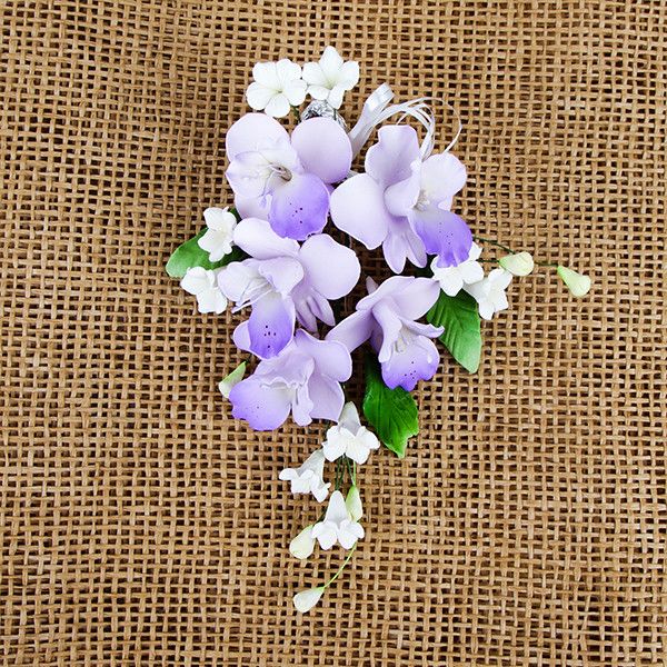 Cooktown Orchid Sprays in Lavender are gumpaste sugarflower cake decorations perfect as cake toppers for cake decorating fondant cakes and wedding cakes. Caljava wholesale cake supply.
