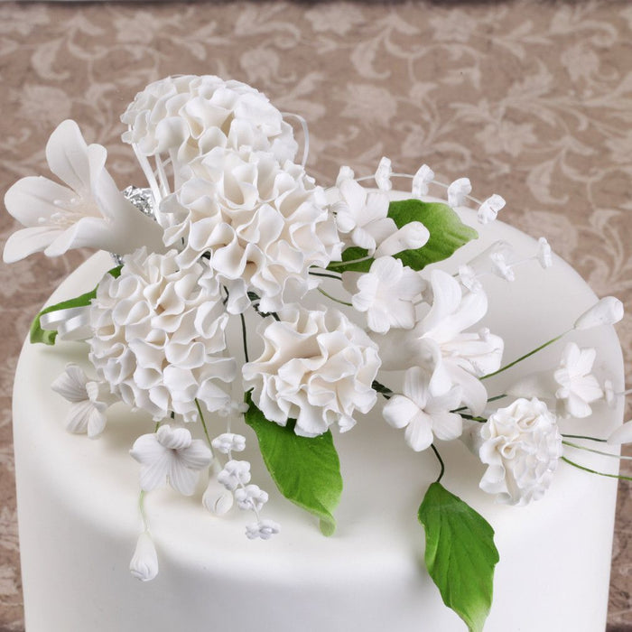 Gumpaste Carnation Sugarflowers are perfect cake decorating fondant wedding cakes & cupcakes. Handmade cake toppers from gumpaste/fondant. Wholesale sugarflower. Caljava Bakery Supplies