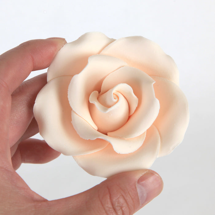 Pre-made ivory gumpaste garden roses by Caljava designed to save labor time and improve bakery kitchen efficiency