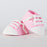 Edible Pink All-Star Baby Shoes (Sneakers) handmade from fondant. Mini handmade fondant baby shoes perfect for cake decorating baby shower cakes easily. Works with Cake decorating baby shower cupcakes. Baby shoe