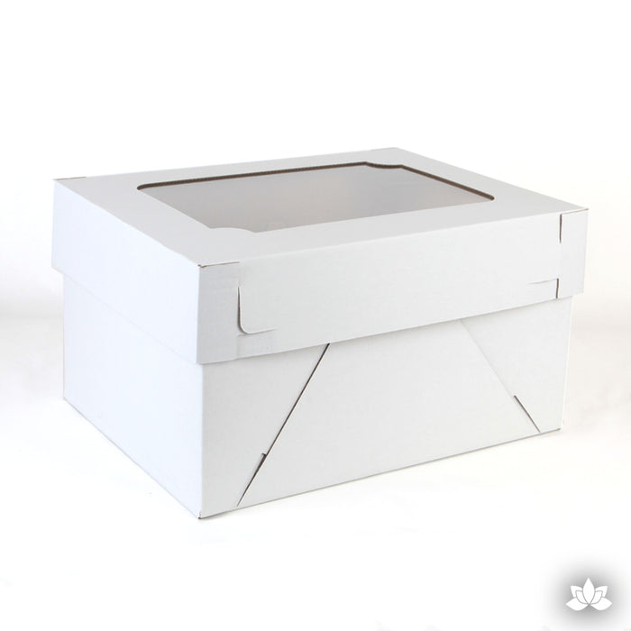 Transport your finished cakes safely with this Window Cake Box. The window allows you to see your beautiful cake creations. White Cake Box