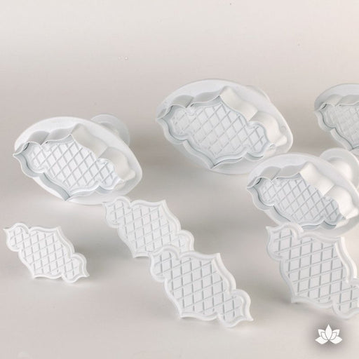 Creative Rolled Fondant Plaque Embossing Cutters and Plungers from PME gumpaste decorating tool for cake decorating, perfect for rolled fondant wedding cakes and birthday cakes.